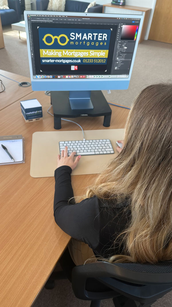 Graphic designer at computer