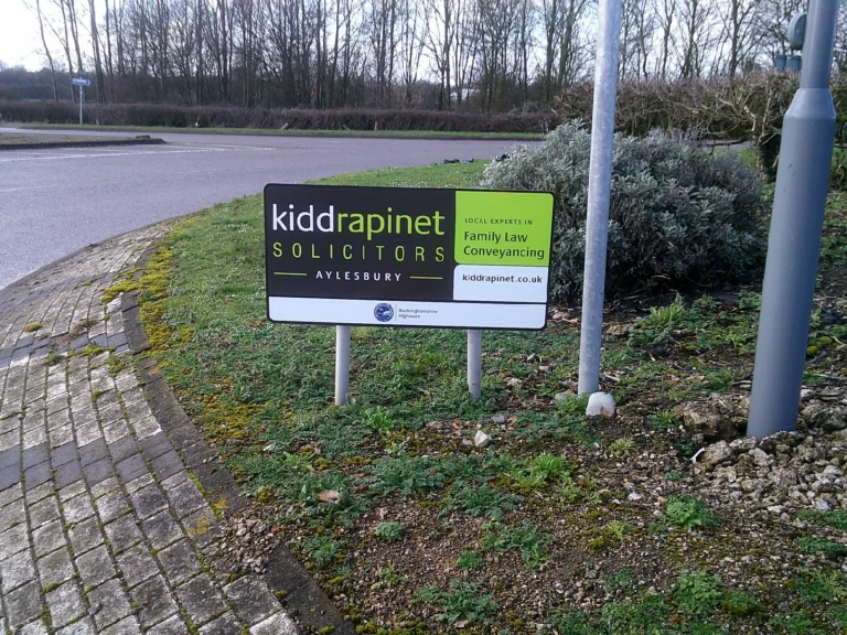 Buckinghamshire roundabout sponsorship sign for solicitors